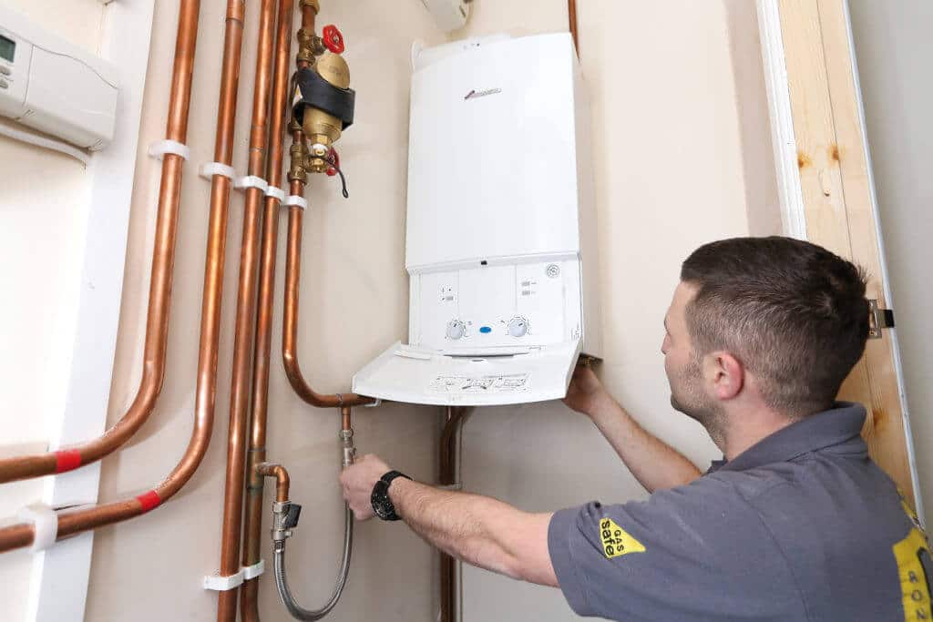 Elderly Couple Having A Free Central Heating System Fitted